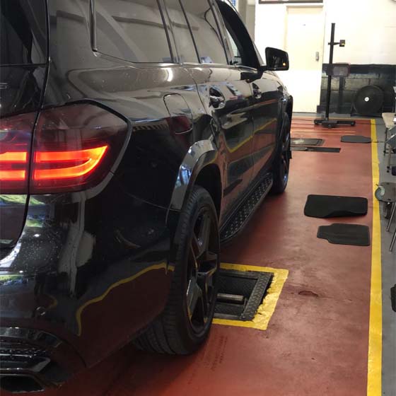 Mechanic performing advanced vehicle diagnostics in Slough